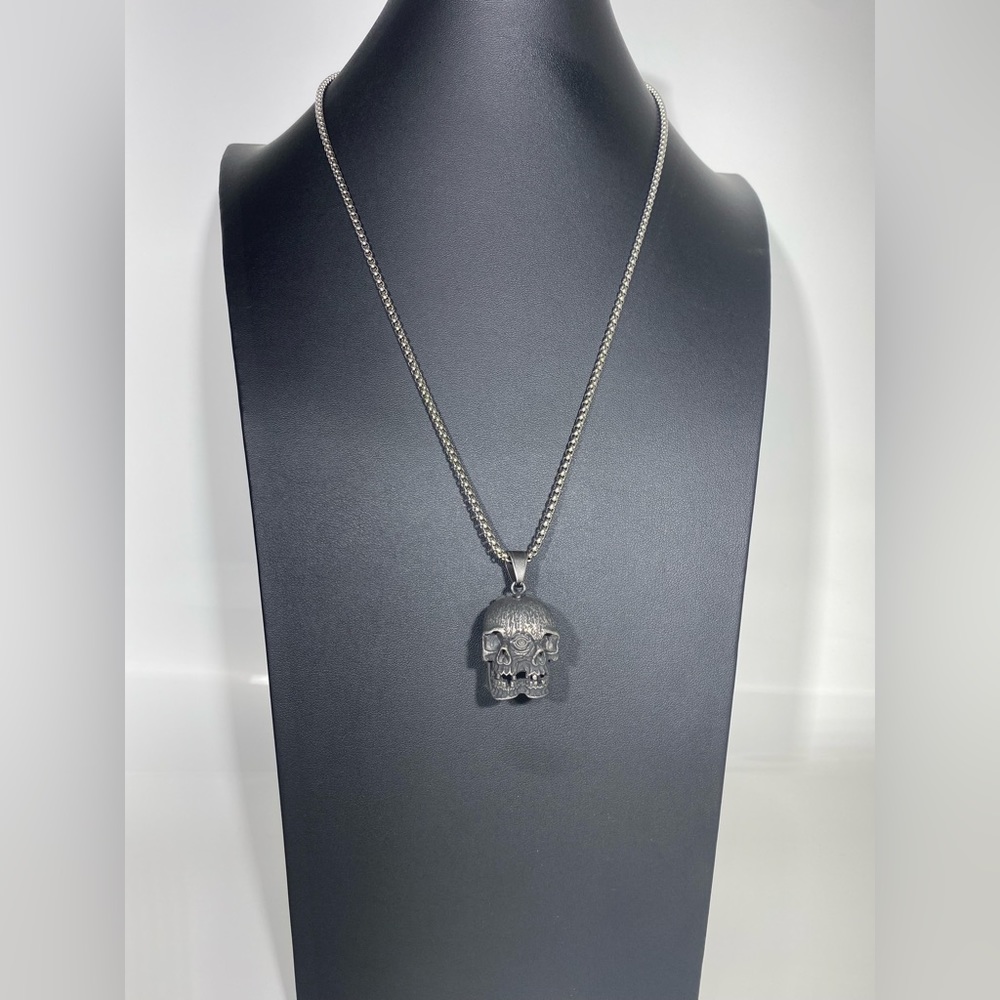 Two-sided Face skull pendant